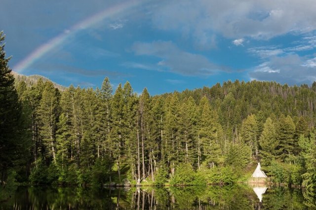 Source: Feathered Pipe Ranch    Price Range  - $$   Book this place   Feathered Pipe Ranch is a premier yoga retreat experience in the heart of Big Sky Montana’s pristine nature. The ranch is inspired by conscious living and providing a peaceful oasis to their guests. There is something for everyone when it comes to exploring this beautiful land! Wander through acres of national forestland spotting brooks and mountain springs and discover open views with the Big Montana Sky above. Sit around the retreat with others in the field overlooking a scenic view of Lake Tipi. Prepare to leave the ranch completely relaxed &amp; recharged.   Bonus:     The Feathered Pipe Foundation    , the retreat center’s non-profit, offers yoga retreats and travel experiences that “honor cultural traditions and encourage individuals to live more mindfully and cooperatively.” It also supports many humanitarian efforts on both local and global levels. Learn more and support their efforts to elevate human consciousness.      Love Shack Eco-Experience