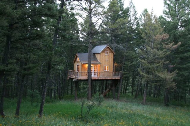 Source: Airbnb    Price Range  - $$   Book this place   The Mountain Treehouse is a rustic &amp; luxury camping experience on an exclusive Bridger Canyon Property. This secluded retreat is off the grid with no electricity or running water and hopes that guests will disconnect and fully immerse themselves in nature. This experience is completely sustainable with simple and private features - keep in mind there are limited amenities. Enjoy an elevated and cozy treehouse stay full of relaxation with forest views of the cool mountain mornings. Add this one to the top of your bucket list!