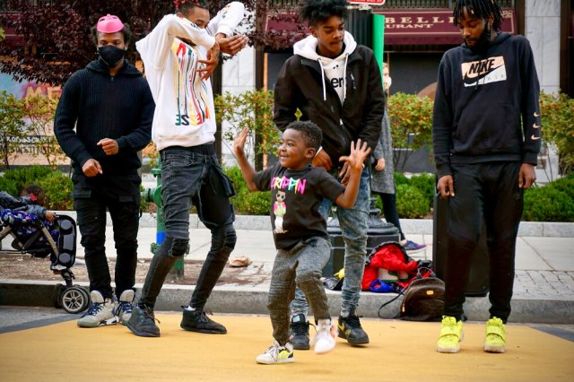 A child dancer joins street performers at Black Lives Matter plaza in Washington DC. 📷  Jaclyn Yost