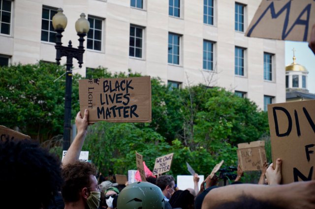 Black Lives Matter signs at a march in Washington DC. 📷  Jaclyn Yost